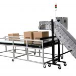 A side by side box filling conveyor