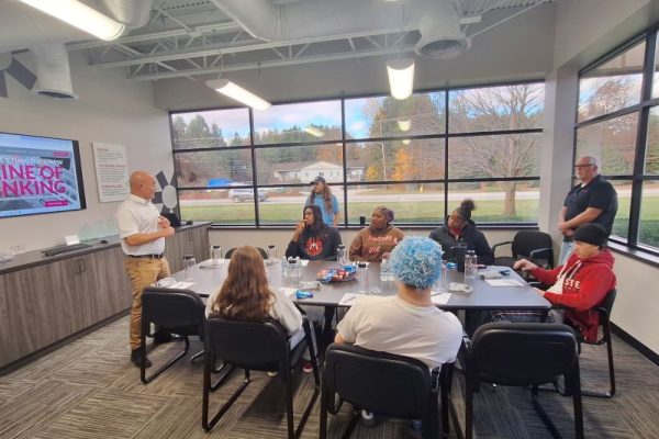 President of Dynamic Conveyor, Jordan Musselman, introducing students to the company