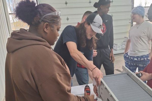 hands on learning during manufacturing week at Dynamic Conveyor